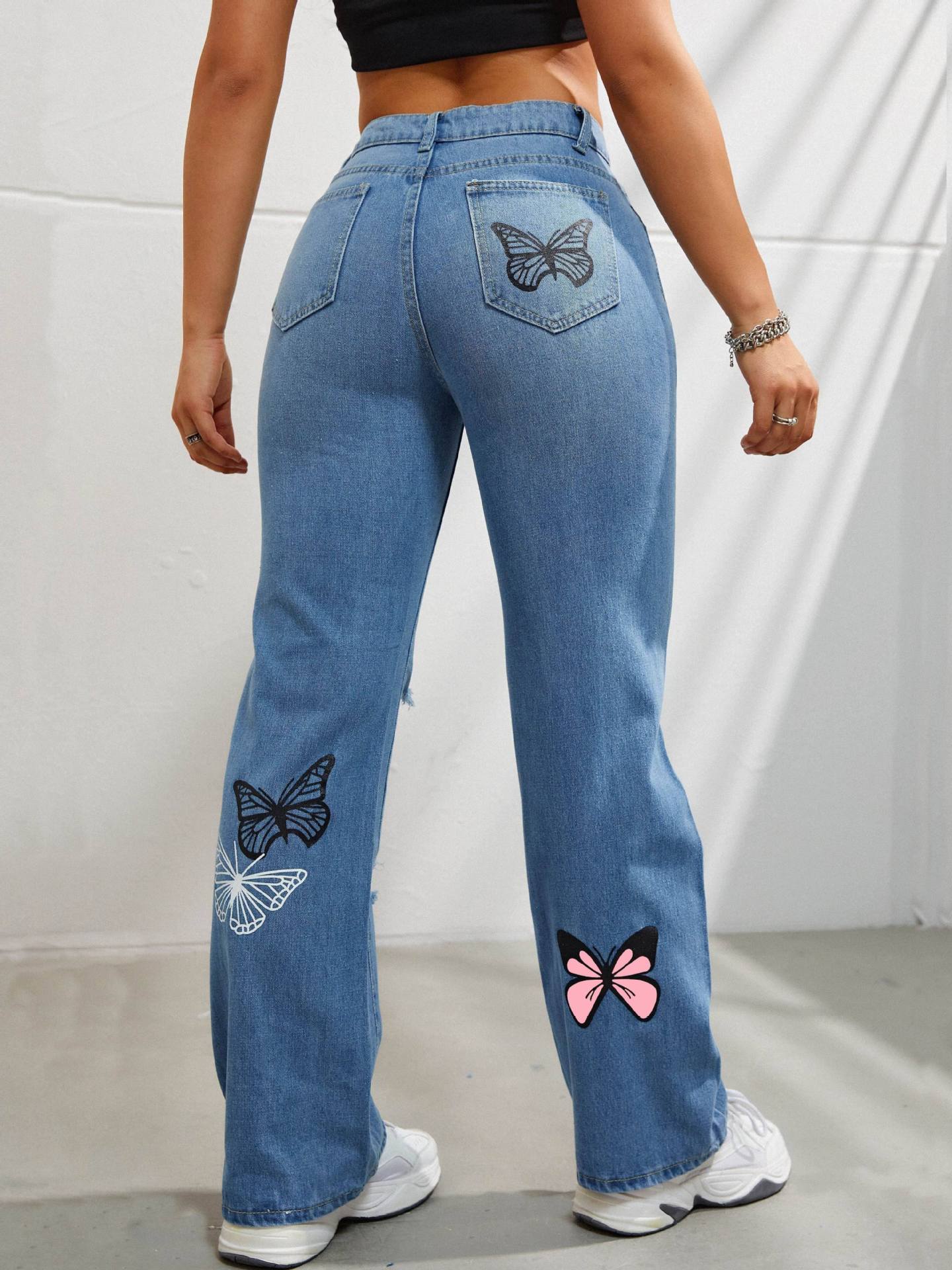 Jean papillon femme bleu délavé finitions distressed