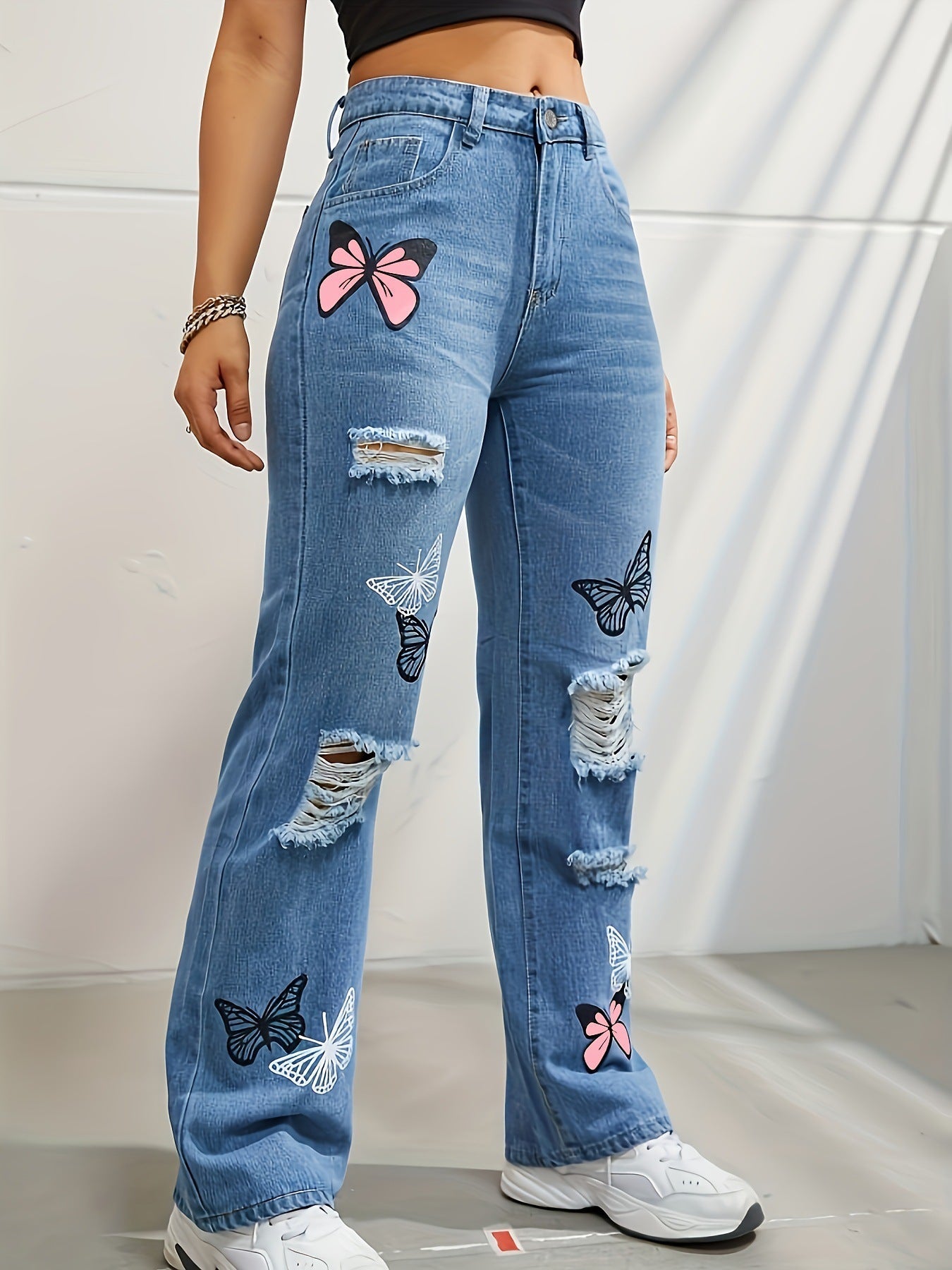 Jean papillon déchiré femme TILLHA PARIS vue détaillée