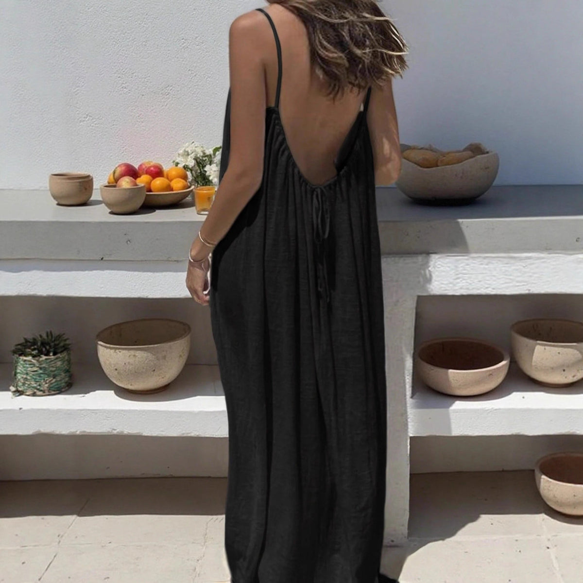 Détail plissé et maille extensible de la robe longue femme